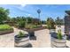 Community garden featuring raised beds, gravel paths and lush plants at 12099 Gavin Ln, Odessa, FL 33556