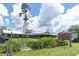 Charming market with windmill and rustic design, perfect for local shopping at 12099 Gavin Ln, Odessa, FL 33556