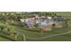 Aerial view of the community pool with many lounge chairs, umbrellas, and tennis courts at 1226 Kazaz Ct, Zephyrhills, FL 33540