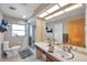 Bright bathroom with a vanity, mirror, and glass-enclosed shower, providing a clean and functional space at 1276 Bermuda St, Clearwater, FL 33755