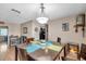 Inviting dining room with a modern chandelier and stylish decor at 1276 Bermuda St, Clearwater, FL 33755