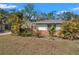 Quaint single-story home featuring charming landscaping and a welcoming exterior at 1276 Bermuda St, Clearwater, FL 33755