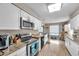 Bright kitchen with stainless steel appliances and granite countertops at 1276 Bermuda St, Clearwater, FL 33755