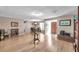 Bright living room with beautiful hardwood floors, neutral walls, and an open layout at 1276 Bermuda St, Clearwater, FL 33755