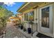 Home's patio area with brick flooring and lush backyard views at 1276 Bermuda St, Clearwater, FL 33755