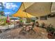 Outdoor patio area with shade covering and patio furniture at 1276 Bermuda St, Clearwater, FL 33755