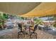 Covered patio area with a brick floor and outdoor dining set at 1276 Bermuda St, Clearwater, FL 33755