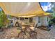 Outdoor patio area with shade covering and patio furniture at 1276 Bermuda St, Clearwater, FL 33755