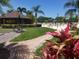 Relaxing pool area with shaded seating and a gazebo at 141 Glendower Cir # 250, Sun City Center, FL 33573