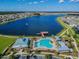 Aerial view of community pool and lake at 18863 Roseate Dr, Lutz, FL 33558