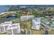 A high angle shot highlights the residences, lake, and golf course views at 220 Belleview Blvd # 108, Belleair, FL 33756