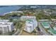 Aerial view showing the condos and neighborhood by the bay at 220 Belleview Blvd # 108, Belleair, FL 33756