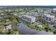 A high angle view shows the waterfront condo next to the community pool at 220 Belleview Blvd # 108, Belleair, FL 33756