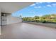 Spacious balcony with serene views of the lake, perfect for relaxing and enjoying the surrounding natural beauty at 220 Belleview Blvd # 108, Belleair, FL 33756