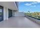 Spacious balcony with serene views of the lake, perfect for relaxing and enjoying the surrounding natural beauty at 220 Belleview Blvd # 108, Belleair, FL 33756