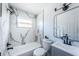 Stylish bathroom features marble shower and updated fixtures at 2835 Freemont S Ter, St Petersburg, FL 33712