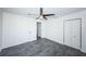 Bright bedroom with grey tile floors and double closet at 2835 Freemont S Ter, St Petersburg, FL 33712
