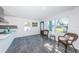 Modern kitchen features stainless steel appliances and gray tile floors at 2835 Freemont S Ter, St Petersburg, FL 33712