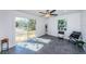 Sunroom with sliding glass doors leading to a deck at 2835 Freemont S Ter, St Petersburg, FL 33712