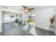 Sunroom features sliding glass doors and hardwood flooring at 2835 Freemont S Ter, St Petersburg, FL 33712