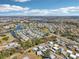 Picturesque view of a community with lovely homes, a winding river, and abundant trees at 301 Andover S Pl # 185, Sun City Center, FL 33573