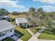 A lovely single-story home with mature landscaping and sidewalks in a tranquil neighborhood at 301 Andover S Pl # 185, Sun City Center, FL 33573