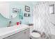Clean bathroom with a vanity, toilet and shower at 301 Andover S Pl # 185, Sun City Center, FL 33573