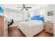 Comfortable bedroom with a ceiling fan and closet at 301 Andover S Pl # 185, Sun City Center, FL 33573