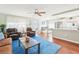 Open-concept living space with a seamless transition to the dining area and modern kitchen, perfect for entertaining guests at 301 Andover S Pl # 185, Sun City Center, FL 33573