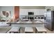 Modern kitchen with stainless steel appliances and an island at 31277 Midnight Sun Way, Wesley Chapel, FL 33545