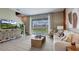 Spacious living room with sliding glass doors to backyard at 31279 Midnight Sun Way, Wesley Chapel, FL 33545
