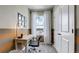 Home office with built-in desk and window with natural light at 31279 Midnight Sun Way, Wesley Chapel, FL 33545