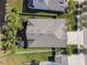 Aerial view of house showing roofline and backyard at 32397 Bannack Ln, Wesley Chapel, FL 33543