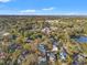 Aerial view of the home and neighborhood, including nearby schools and a body of water at 345 Dr Ml King Jr N St, Safety Harbor, FL 34695