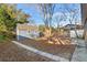 Backyard with shed, arbor, and stone pathway at 345 Dr Ml King Jr N St, Safety Harbor, FL 34695