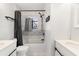 Modern bathroom with tiled shower/tub and double vanity at 345 Dr Ml King Jr N St, Safety Harbor, FL 34695