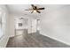 Bedroom with mirrored closet doors and ceiling fan at 345 Dr Ml King Jr N St, Safety Harbor, FL 34695