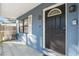 Front porch detail with white railing and access to the front door at 345 Dr Ml King Jr N St, Safety Harbor, FL 34695