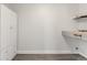 Laundry room with built-in cabinetry and shelving at 345 Dr Ml King Jr N St, Safety Harbor, FL 34695