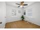 Charming bedroom with hardwood floors and a built-in desk area at 3645 5Th S Ave, St Petersburg, FL 33711