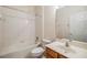 A bright full bathroom features a vanity, toilet, and tub with shower at 3900 Claybrook Dr, Wesley Chapel, FL 33544