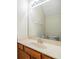 A half bathroom with a single sink vanity and modern faucet at 3900 Claybrook Dr, Wesley Chapel, FL 33544