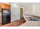 Well-equipped kitchen boasts wood cabinets and stainless steel appliances at 3900 Claybrook Dr, Wesley Chapel, FL 33544