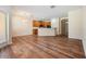 Spacious living room with open floor plan and wood-look flooring throughout at 3900 Claybrook Dr, Wesley Chapel, FL 33544