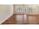 An open living space with hard wood flooring and natural light at 3900 Claybrook Dr, Wesley Chapel, FL 33544