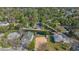 Aerial view showing a waterfront lot nestled among other houses at 6119 Beacon Point Dr, Weeki Wachee, FL 34607