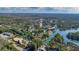 Aerial view showcasing a home's location near water and other properties at 6119 Beacon Point Dr, Weeki Wachee, FL 34607