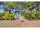 Cute light blue house with walkway and mailbox at 6119 Beacon Point Dr, Weeki Wachee, FL 34607