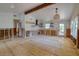 Under renovation kitchen with exposed beams and new flooring at 6119 Beacon Point Dr, Weeki Wachee, FL 34607