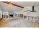 Under renovation living area, featuring a fireplace and kitchen at 6119 Beacon Point Dr, Weeki Wachee, FL 34607